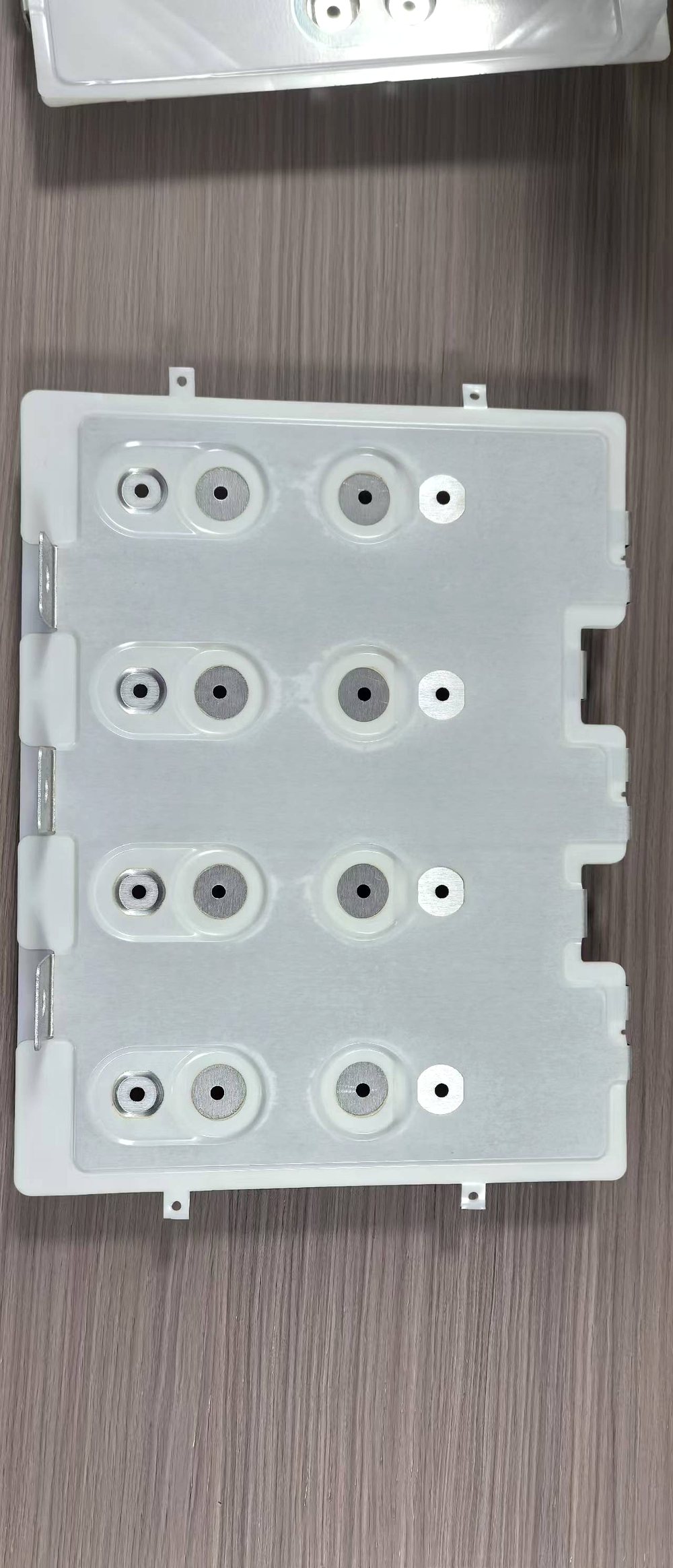 Multi-layer insulated laminated busbar with copper terminal studs