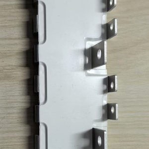 Laminated DC link busbar for power inverters with blade terminals